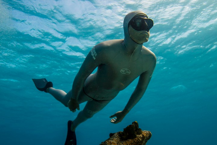 a person swimming in the water